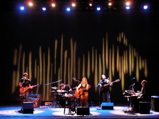Pop Folk festivals performer Dar Williams with her band at their work performance on stage in theater sexy pic