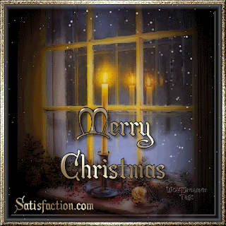 Very beautiful glowing candle reflects in glass and stylish letters of Merry Christmas wishes in night background free Christian Christmas photo download