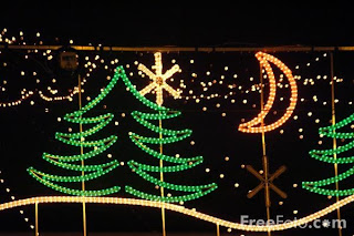 Christmas(X-mas) decoration of Christmas tree lighting and Half moon yellow lighting in night at outdoor of house picture download for free