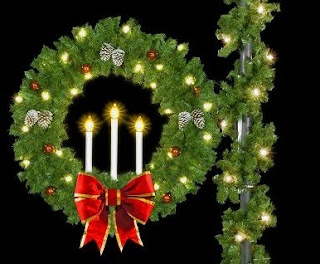 Christmas wreath decorated with lighting and beautiful candles Outdoor Christmas decoration for Christmas free download Christmas Christian religious clip art pictures and coloring pages