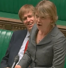 Cooper conceals CRASness of Crossrail as she causes Timms to smile with her staged act...