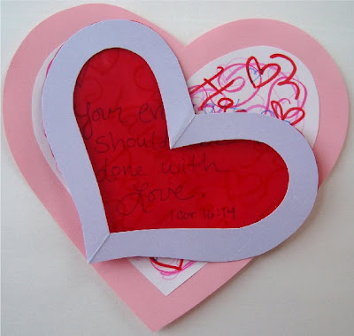 Scribbled valentine with plastic heart decoder