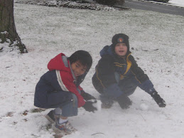 Alex and Jake making a snowman