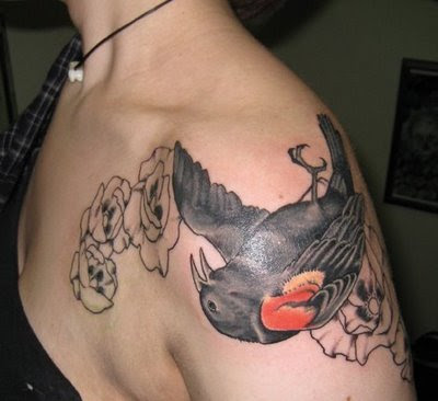 tattoo de angeles. sort of animal tattoo is a