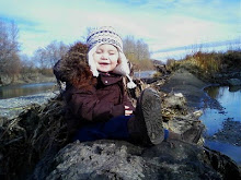 Sitting on a log in the river