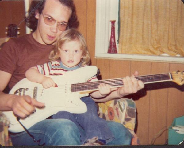 Dad and Tom playing guitar