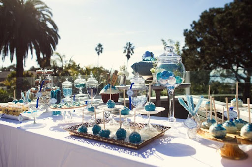 and aqua to teal were blended with warm amber glassware silver and gold and aqua to teal were blended with warm amber glassware silver and gold