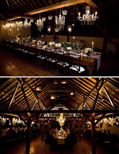 chandeliers hanging in rustic barn