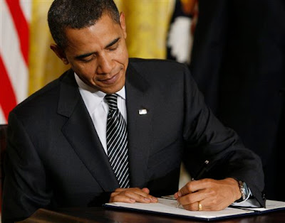 Obama signs health care
