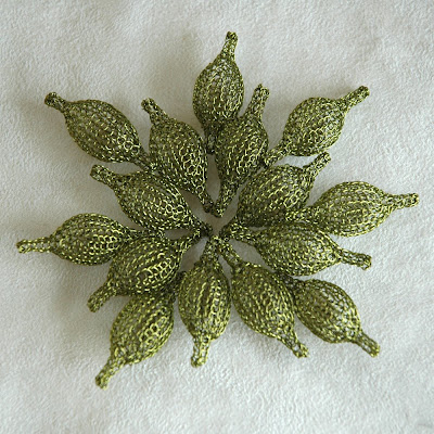 green wire crochet pods