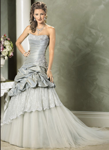 I'm in love with this silver dress Not all winter wedding dresses have to 