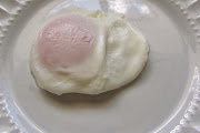 Perfect poached egg is cooked in residual heat and not poached at all. (poached egg )