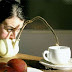 An unusual way to pour water to a cup of tea: 18 An unusual way to pour water to a cup of tea: 18
