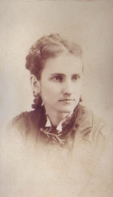 Young Woman with Sprig Brooch