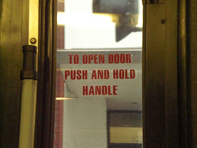 To Open Door Push and Hold Handle - Santa Monica