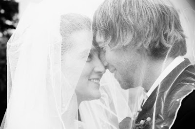 couple leaning forheads wedding vows