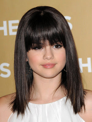 selena gomez hair short and curly. selena gomez curly hair short.