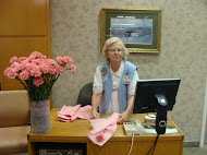 Ernestine Stewart, St.Mary's Volunteer, handed out pink carnations to each woman.