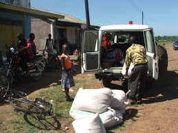 Delivering maize to a village on outreach