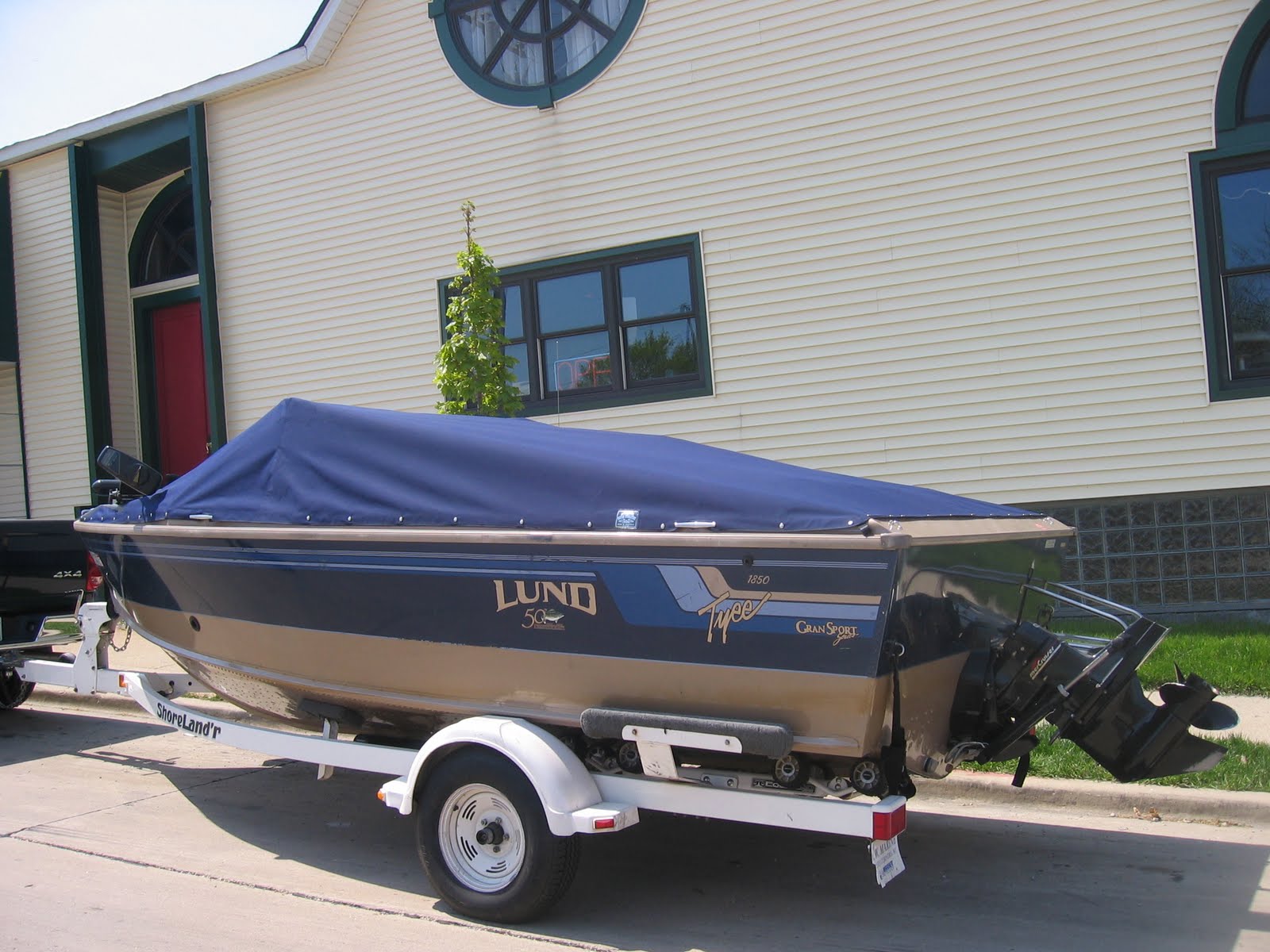 Homestyle Custom Upholstery and Awning Mooring Cover and Bimini On a Lund