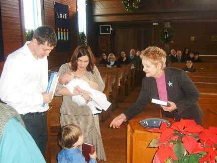 [Julia+presenting+Bibles+to+Neil+&+Sophie+Purcell+children+of+Chris+&+Gayle++Dec.+30.jpg]