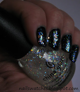 Bourjois Bleu Misterieux topped with China Glaze Snowglobe bourjois blue mysterieux dark blue creme looks black on the nail nail polish nailswatches china glaze glitters snowglobe layered