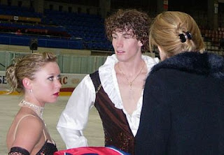 Rachel Tibbetts and Collin Brubaker prepare to compete at the 2007 JGP Romania. Photo courtesy worldwideice.com