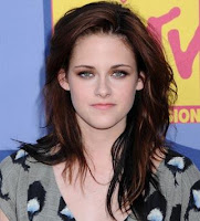 Her locks might be dark, but Kristens hair contained a myriad of shades ...