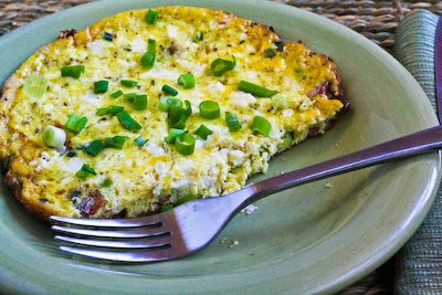 Eggs with bacon, feta, and green onion