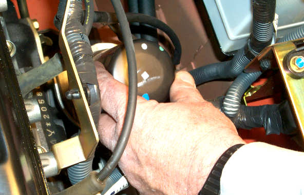 How do you change the transmission fluid in a forklift?