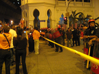 Candlelight vigil demonstrators face off riot police Candlelight vigil demonstrators face off riot police