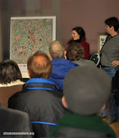 Amanda DeCort shares a map of Tulsa as Sarah Lobos look on.
