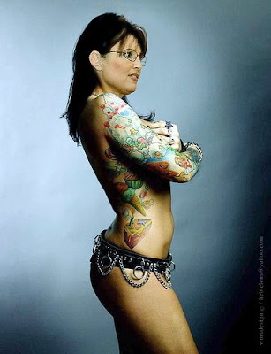 tattooed lady. More on tribal sun tattoo and tribal tattoos for women.