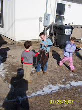 the three kids with the fish they caught!!!