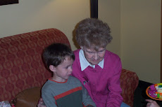 grandma and spencer opening gifts together!