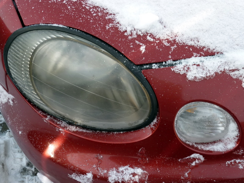 How do you clean plastic headlights?