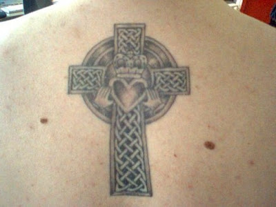 irish celtic cross tattoo with names in gothic lettering by dublin ireland