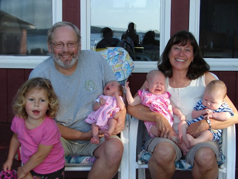 Tom & Beth at lake with grandchildren