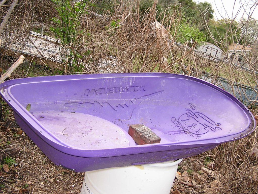John Starnes' Urban Farm A free, freestanding rain barrel