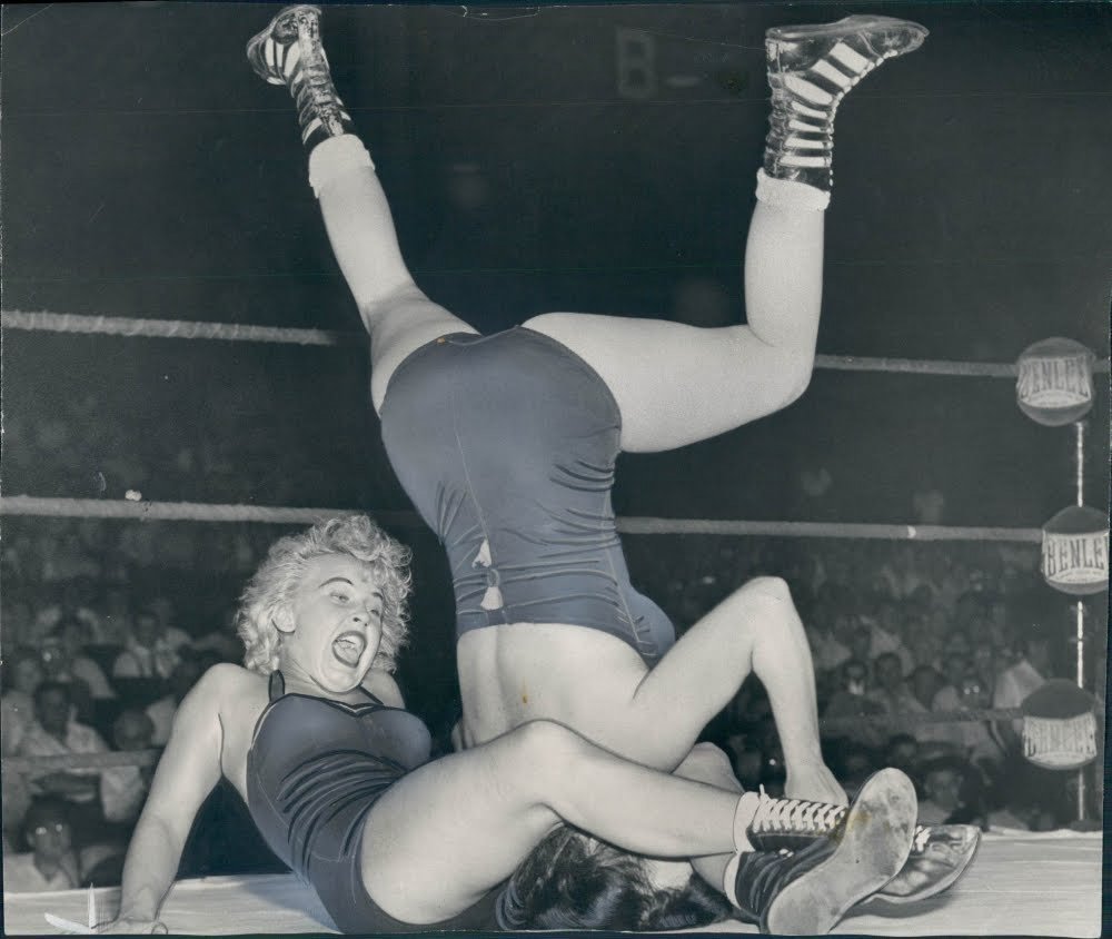 Female bikini ring wrestling