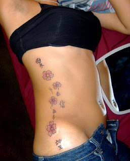 Cherry Blossom Tattoo Designs With Image Female Tattoo With Japanese Cherry Blossom Tattoo On The Side Body Picture 1