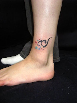 simple tattoo designs on feet with small star tattoo and tribal designs