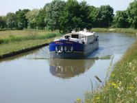 French Hotel Barge Enchanté cruises south. Book with ParadiseConnections.com