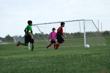 Dawson has the hot pink shirt on!He is very proud of it. :)