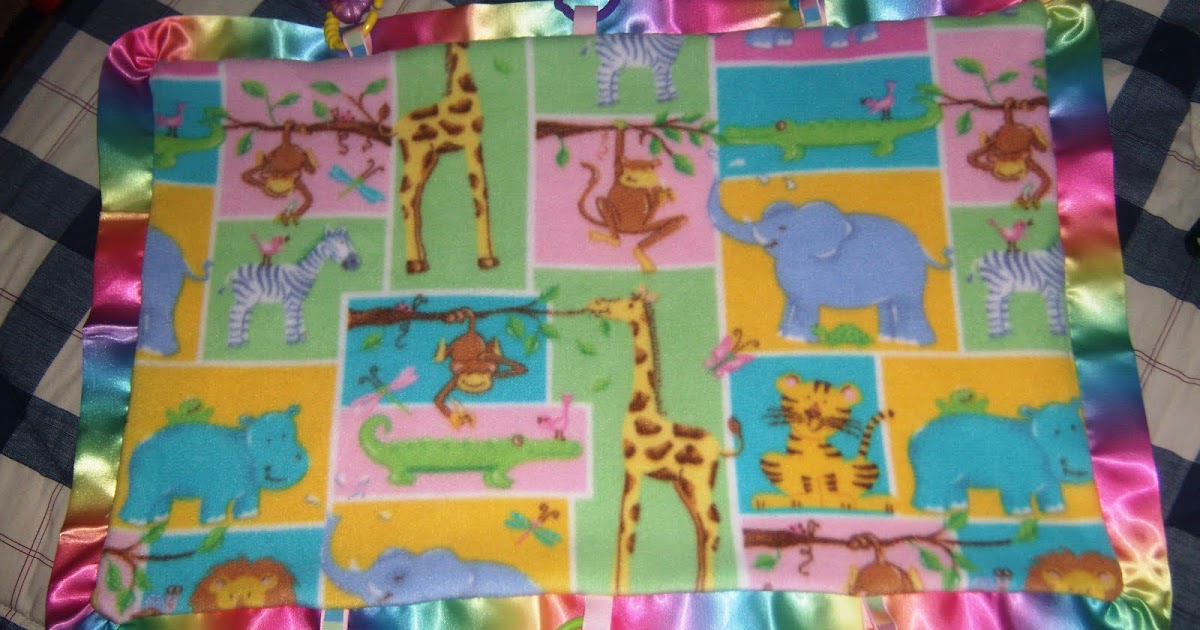 baby blanket with toys attached