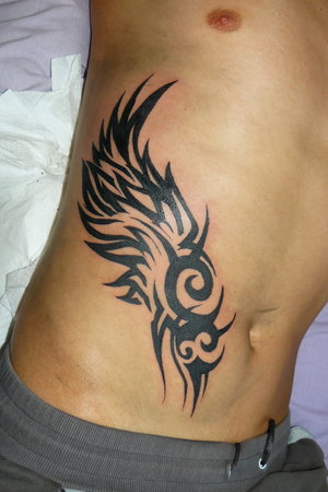 tribal tattoo women. tribal tattoo wings.