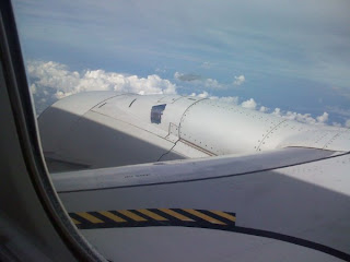 a view of the wing of an airplane