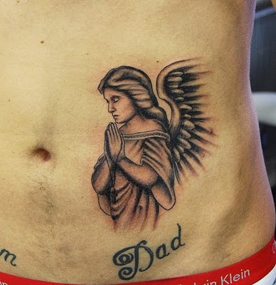Praying Angel Religious Tattoo Design The angel tattoo also represents your 