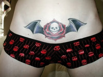 Skull Flower and Bat Wings Tattoo Design. RANDOM TATTOO QUOTE: "I'm the man