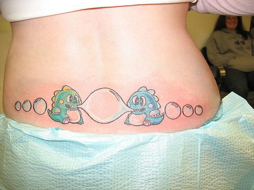 tattoos for ladies lower back. Tattooed Women Lower Back